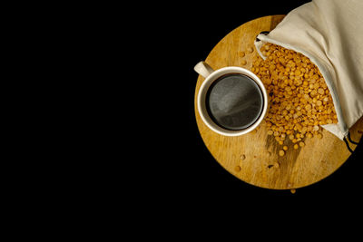 High angle view of coffee cup on table