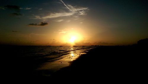 Scenic view of sea at sunset