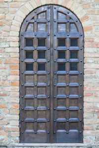 Closed window on wall of building