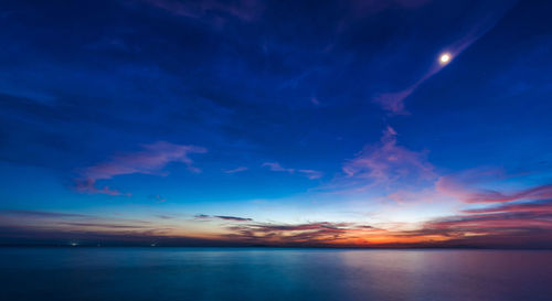 Scenic view of sea against sky at night