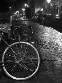 Bicycle on street in city at night