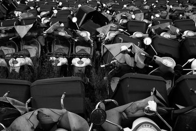 High angle view of scooters parked on field