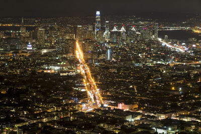 High angle view of illuminated cityscape at night