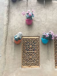 Flowers against wall
