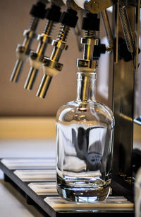 Close-up of beer tap in bar