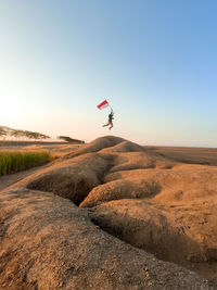 Scenic view of land against clear sky