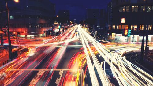 Light trails on street in city at night