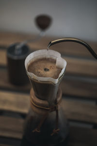 Close-up of coffee cup on table