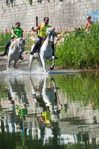 Reflection of people on water