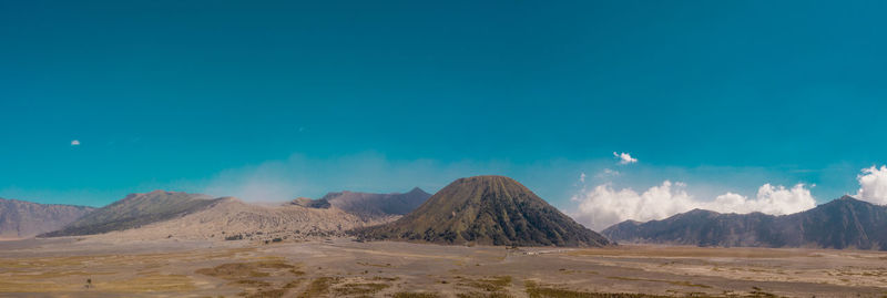 Panoramic view of desert against sky