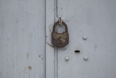 Close-up of padlock on door