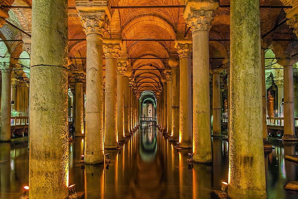 architecture, built structure, the way forward, indoors, architectural column, transportation, diminishing perspective, arch, illuminated, vanishing point, in a row, building exterior, building, connection, no people, empty, narrow, long, column, reflection