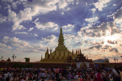 Group of people in temple against building