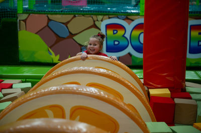 Children play a variety of games in fun room