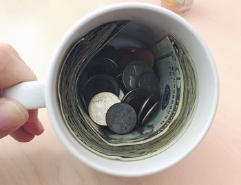 Close-up of hand holding bowl