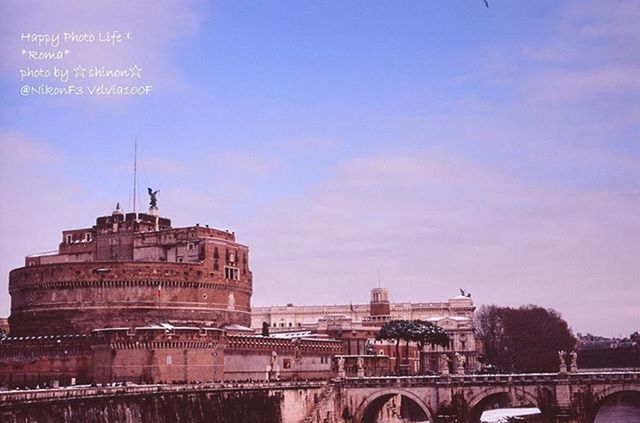 architecture, built structure, building exterior, sky, city, travel destinations, famous place, bridge - man made structure, connection, travel, capital cities, international landmark, tourism, transportation, outdoors, blue, low angle view, city life, red, sunset