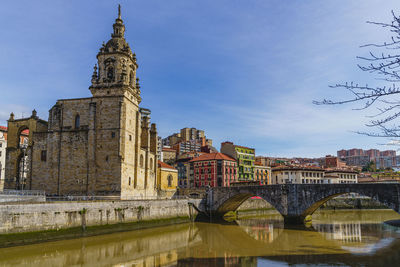 Bridge over river against sky