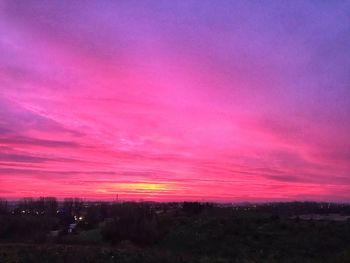 Scenic view of dramatic sky during sunset