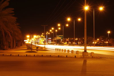 Cars on street at night