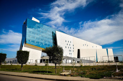 Low angle view of buildings against blue sky