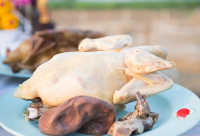 Boiled chicken in dish on the table.