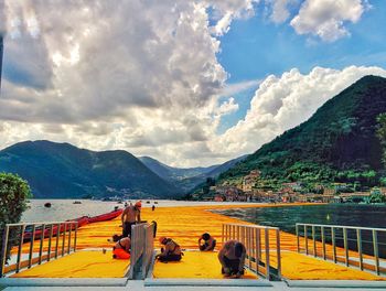 Scenic view of mountains against cloudy sky