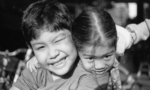 Portrait of happy siblings