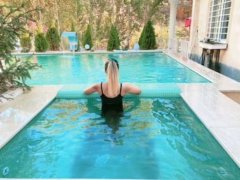 Woman swimming in pool