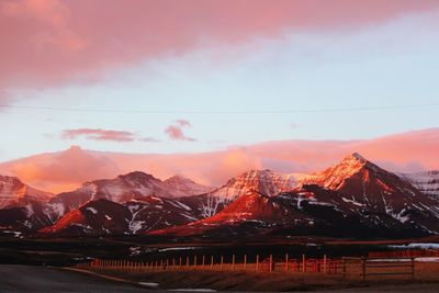 Scenic view of mountains against sky at sunset