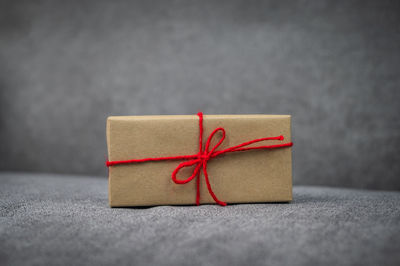 Close-up of red paper in box on table