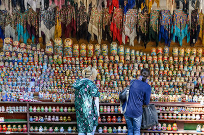 Women buying decoration in market