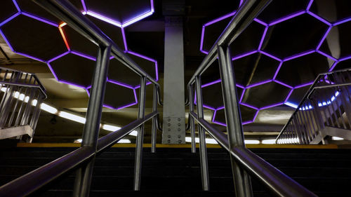 Low angle view of illuminated lights at night