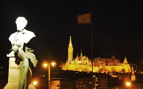 Illuminated temple at night