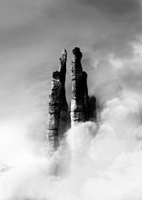 Low angle view of rocks against sky