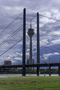 View of bridge against cloudy sky