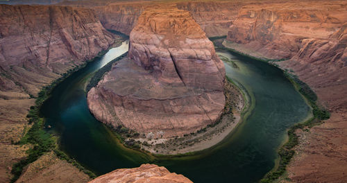 High angle view of rock formations at riverbank