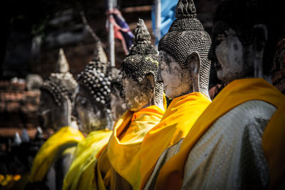 Buddha statues in row