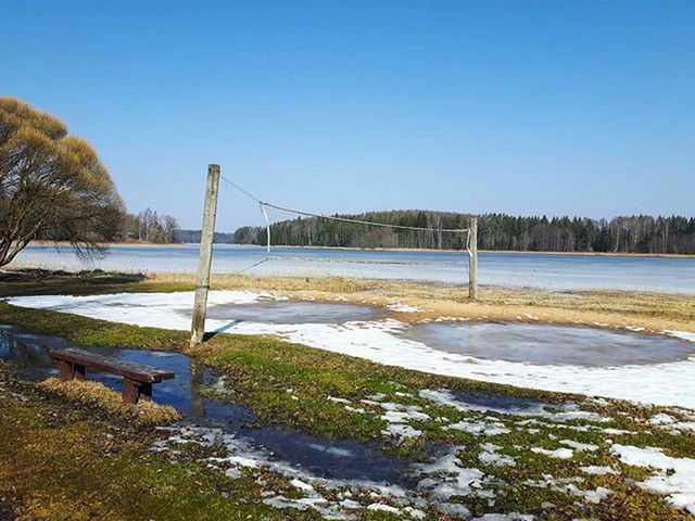 VIEW OF SUSPENSION BRIDGE AGAINST CLEAR SKY