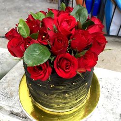 High angle view of red rose on table