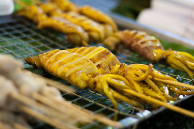 Close-up of meat on barbecue grill