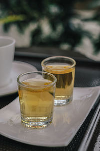 Close-up of tea in glass on table