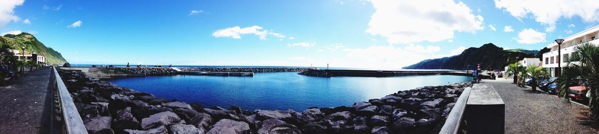 Panoramic view of sea against cloudy sky