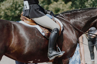 Woman riding horse