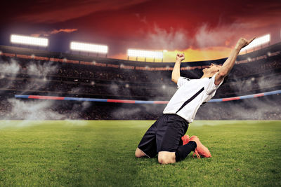 Man playing soccer on field