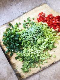 High angle view of vegetables on cutting board