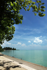 Scenic view of sea against cloudy sky