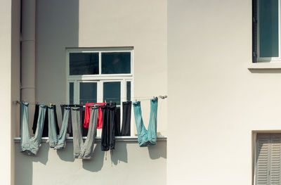 Clothes drying against building