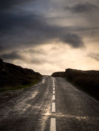 Empty road along landscape