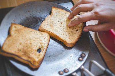 Close-up of man preparing food