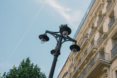 Low angle view of street light against clear sky